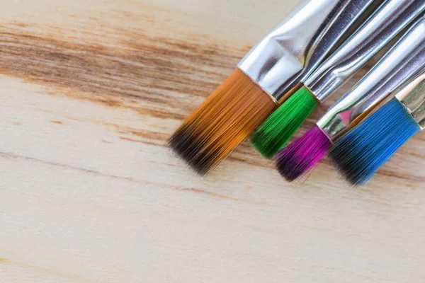 Arka plan sanat. Ahşap tuval üzerine resim için fırçalar