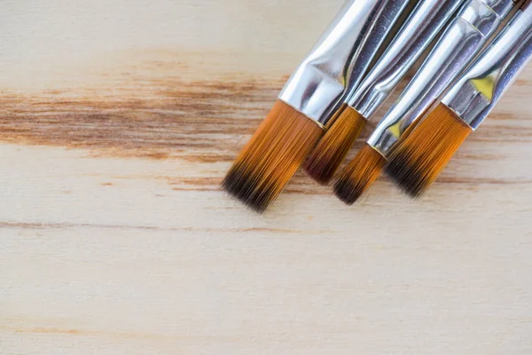Arka plan sanat. Ahşap tuval üzerine resim için fırçalar
