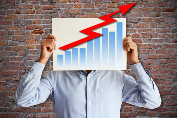 Sales increase strategy concept with businessman with chart and red ascending arrow on white board