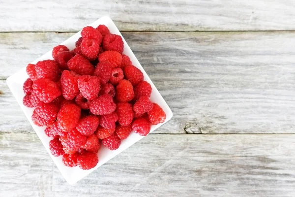 Fresh Ripe Raspberry White Plate Isolated Wooden Table Background — Stock Photo, Image