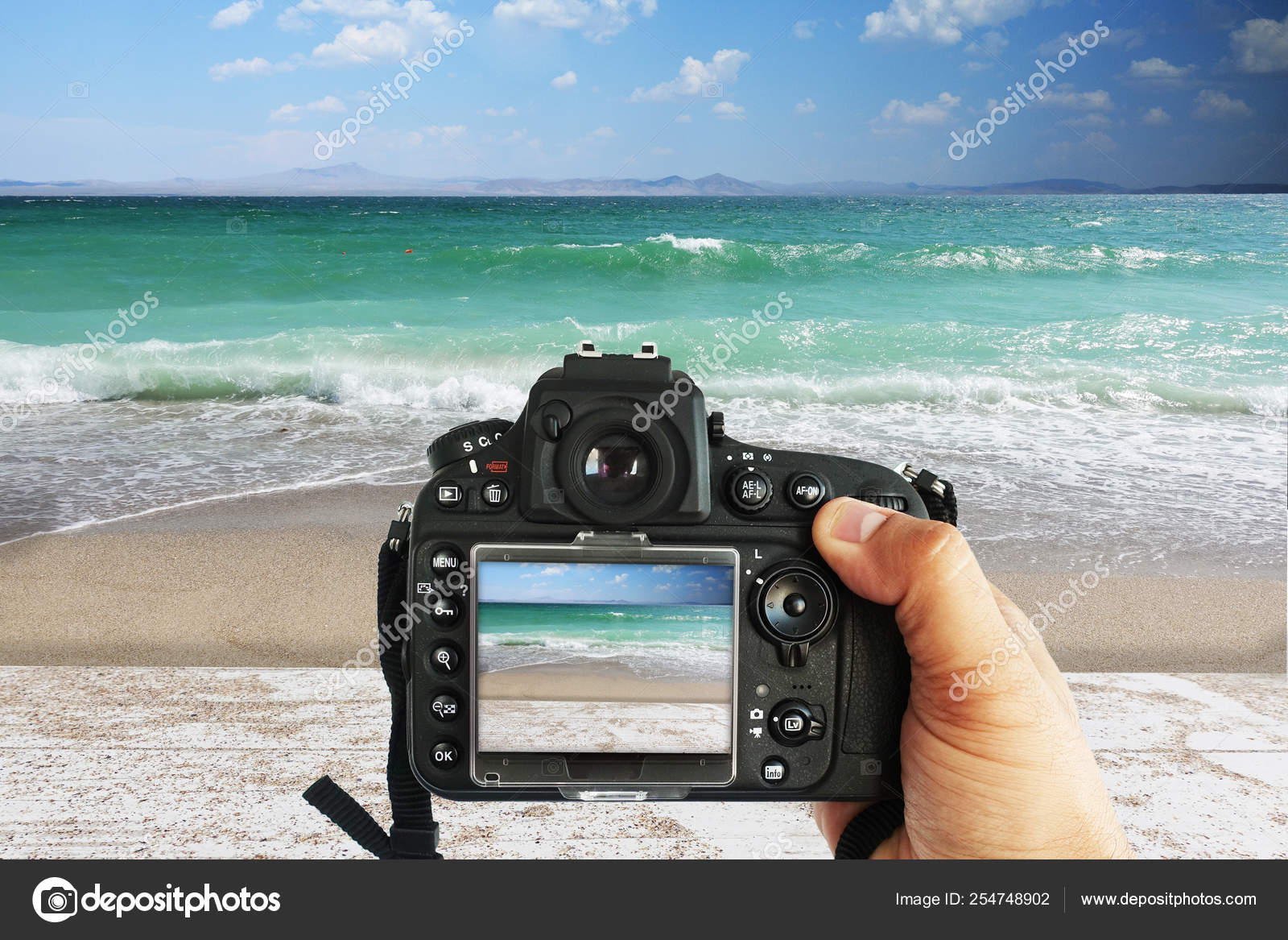 Man Photographer Beach Taking Photo Sea Dslr Camera — Stock Photo © Ai825  #254748902