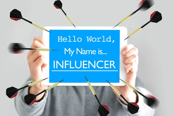 Hello world, my name is influencer text on whiteboard in young blogger hands
