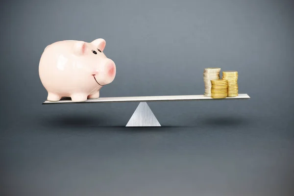 Balance between investment and savings or costs with piggy bank and piles of cash money in balance