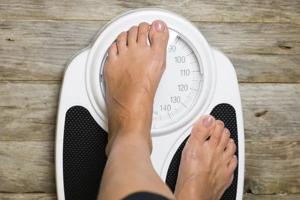 Woman Covering Weighting Scale Display Secret Weight — Stock Photo, Image
