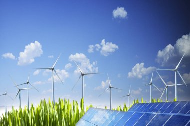 Wind turbines in rural landscape, renewable energy background