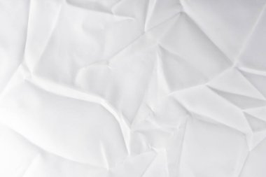 Eski ve harap olmuş kıvrımlı kağıt dokusu. beyaz buruşuk kumaş