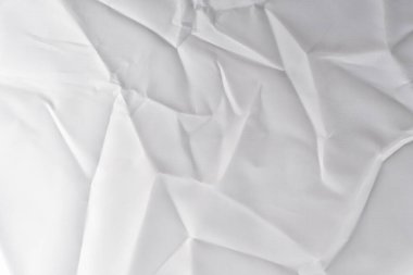 Eski ve harap olmuş kıvrımlı kağıt dokusu. beyaz buruşuk kumaş