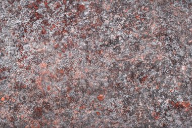 Eski yanmış metal yüzey, paslı doku, aşınma arka planı.