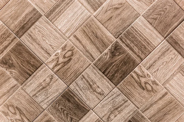 Wooden brown mosaic floor texture, interior design wood parquet background