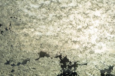 Kış camında buz desenleri