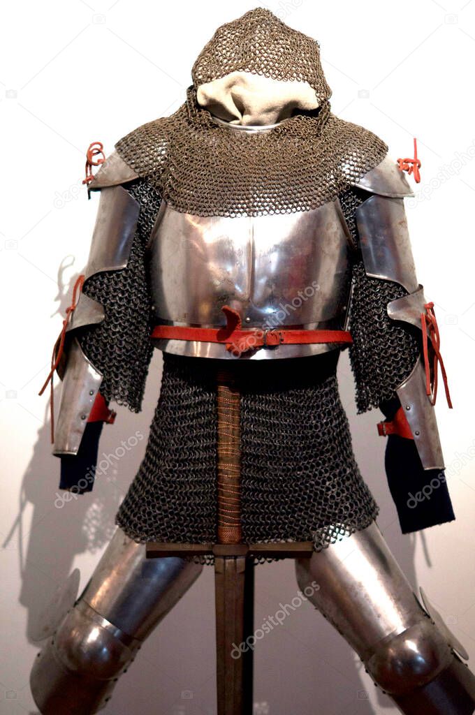 Ancient knightly armor of a medieval warrior in a museum