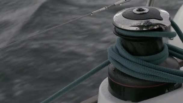 Winch and rope close up on sailing vessel slow motion. — Stock Video