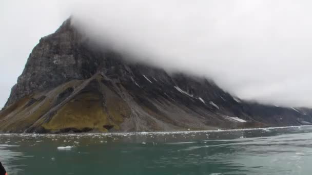 Hills and mount on coast on background of Arctic Ocean in Svalbard. — Stock Video