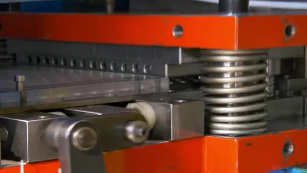 Cutting holes perforation stamping of metal sheets on industrial CNC machine. — Stock Video