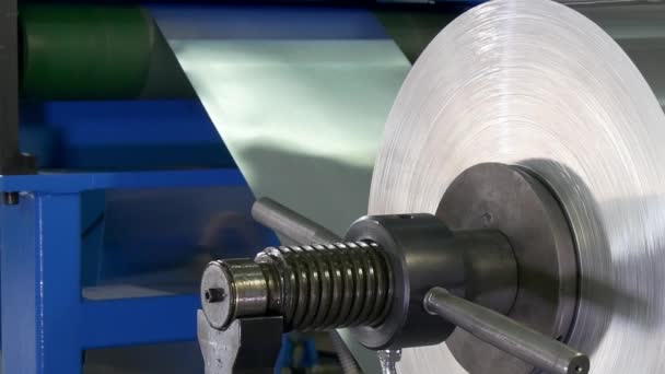 Roll of metal sheets on industrial CNC machine. — Stock Video