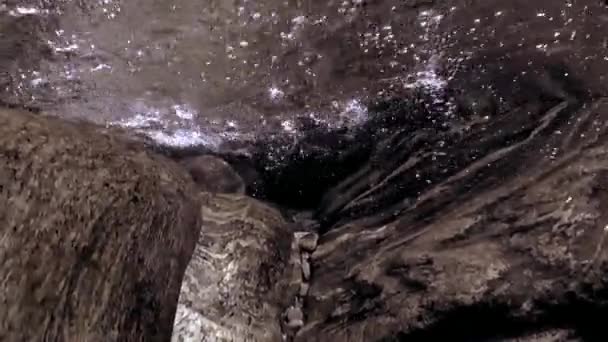 Huge smooth stones and rocks underwater of transparent river Verzasca. — Stock Video