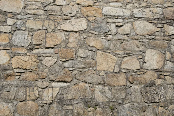 粗い石の壁の背景のテクスチャ — ストック写真