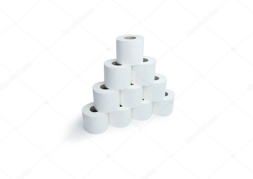 White toilet roll paper stacked in a pyramid shape. Angled shot from above, isolated on white with soft shadow.