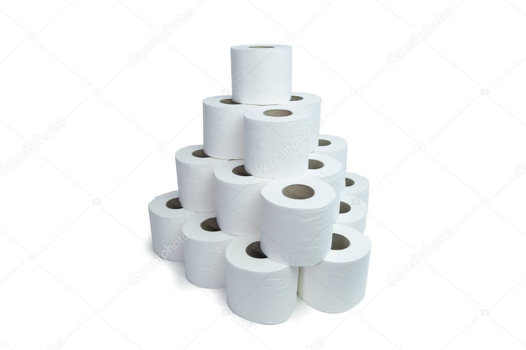 White toilet paper rolls stacked into a pyramid, perspective shot from front