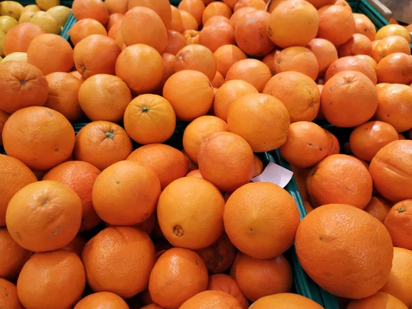 Fresh organic oranges from Algarve for sale in a supermarket in Portugal. Close up.