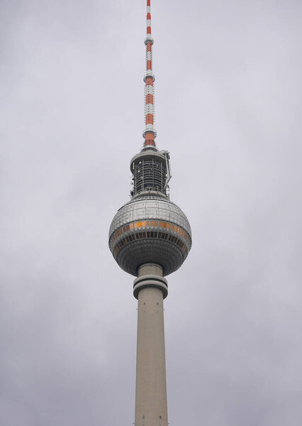 Fensehturm TV tower in Berlin, Germany on a cloudy overcast day. Close up