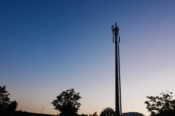 Cell Phone Tower Communications Antenna Mast Silhouette Dusk Blue Orange — Stock Photo, Image