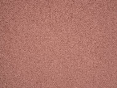 Sert pastel, pembe / açık kırmızı boyalı duvar, sıva desenli..