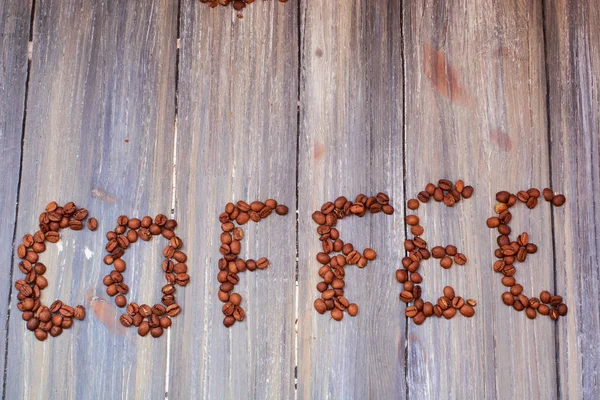 coffee bean lettering close-up top view on