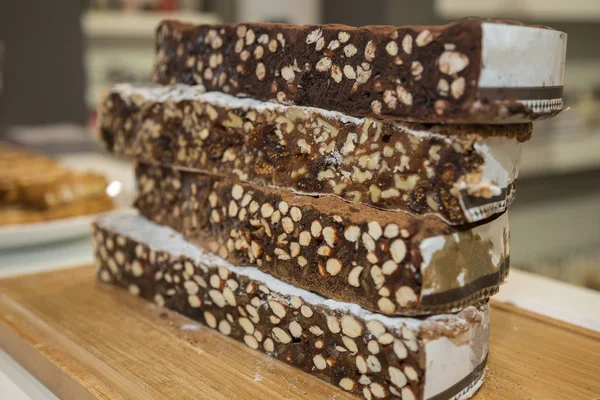 Typical Italian Festive Cakes one over the other: Panforte from Tuscany.