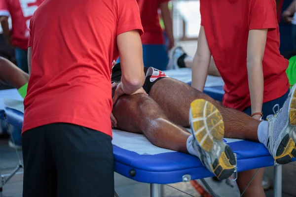 Athlete Lying Bed While Having Legs Massaged Physical Sports Workout — Stock Photo, Image