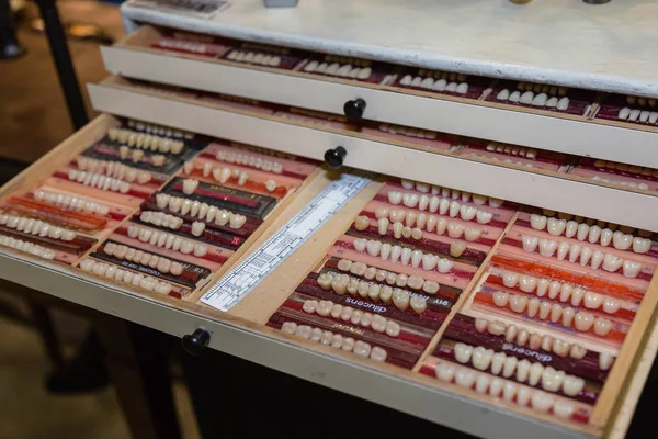 Different Types of Resin Dental Prosthesis inside a Drawer — Stock Photo, Image