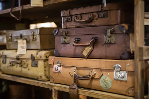 Old Leather Travel Cases on a Shelf — Stock Photo, Image