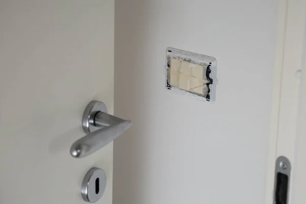 Switches and Sockets Covered with Painting Masking Tape — Stock Photo, Image