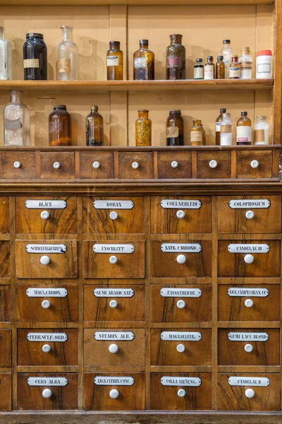 Antique Wooden Drawers of a Chemistry Laboratory and Glass Bottles — Stock Photo, Image