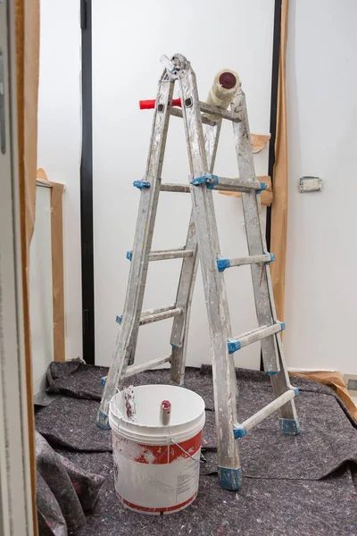 Staircase and Tools for Painting and Floor Covered with Protective Sheeting — Stock Photo, Image