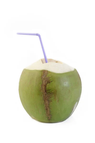 Grüne Kokosnüsse Mit Trinkhalm lizenzfreie Stockbilder