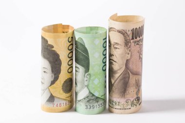 Kore won ve Japon Yen banknot parası.