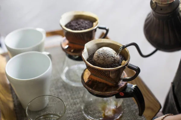 Alternative manual hand coffee brewing in origami dripper with paper filter