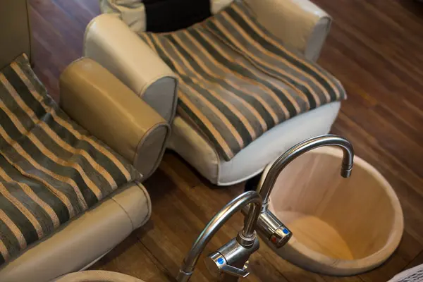 Foot spa massage sofa chair for relaxation.