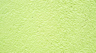 Arkaplan için yeşil çimento duvar.