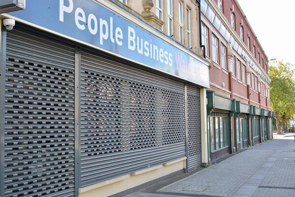 Barry, Vale of Glamorgan / Wales - Sept 29 2020: Hoton Road. Coronavirus crisis causes global recession hitting commercial sector hard. Childrens play centre shut down, ghost towns and urban decay becomes the new normal. A feeling of hopelessness