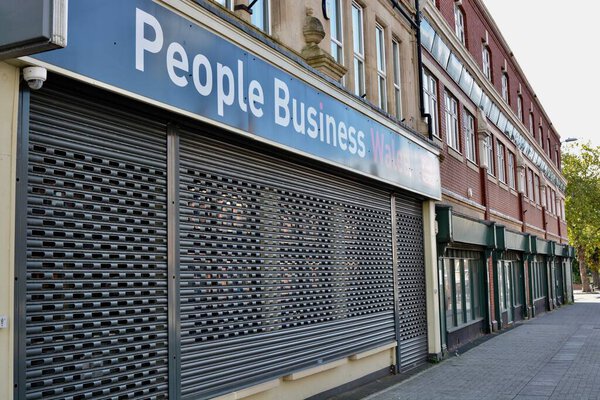 Barry, Vale of Glamorgan / Wales - Sept 29 2020: Hoton Road. Coronavirus crisis causes global recession hitting commercial sector hard. Childrens play centre shut down, ghost towns and urban decay becomes the new normal. A feeling of hopelessness