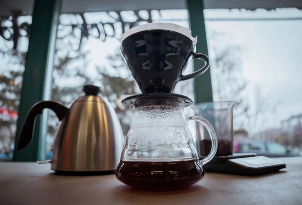 Filtered coffee,fresh v60 on table,soft focus