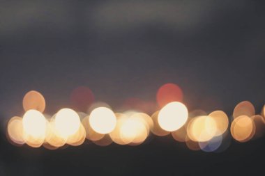 Kırmızı ve turuncu, sarı Bokeh arka plan için daireler çiziyor, parlak ışık odaklı ve bulanık Bokeh, renkli..