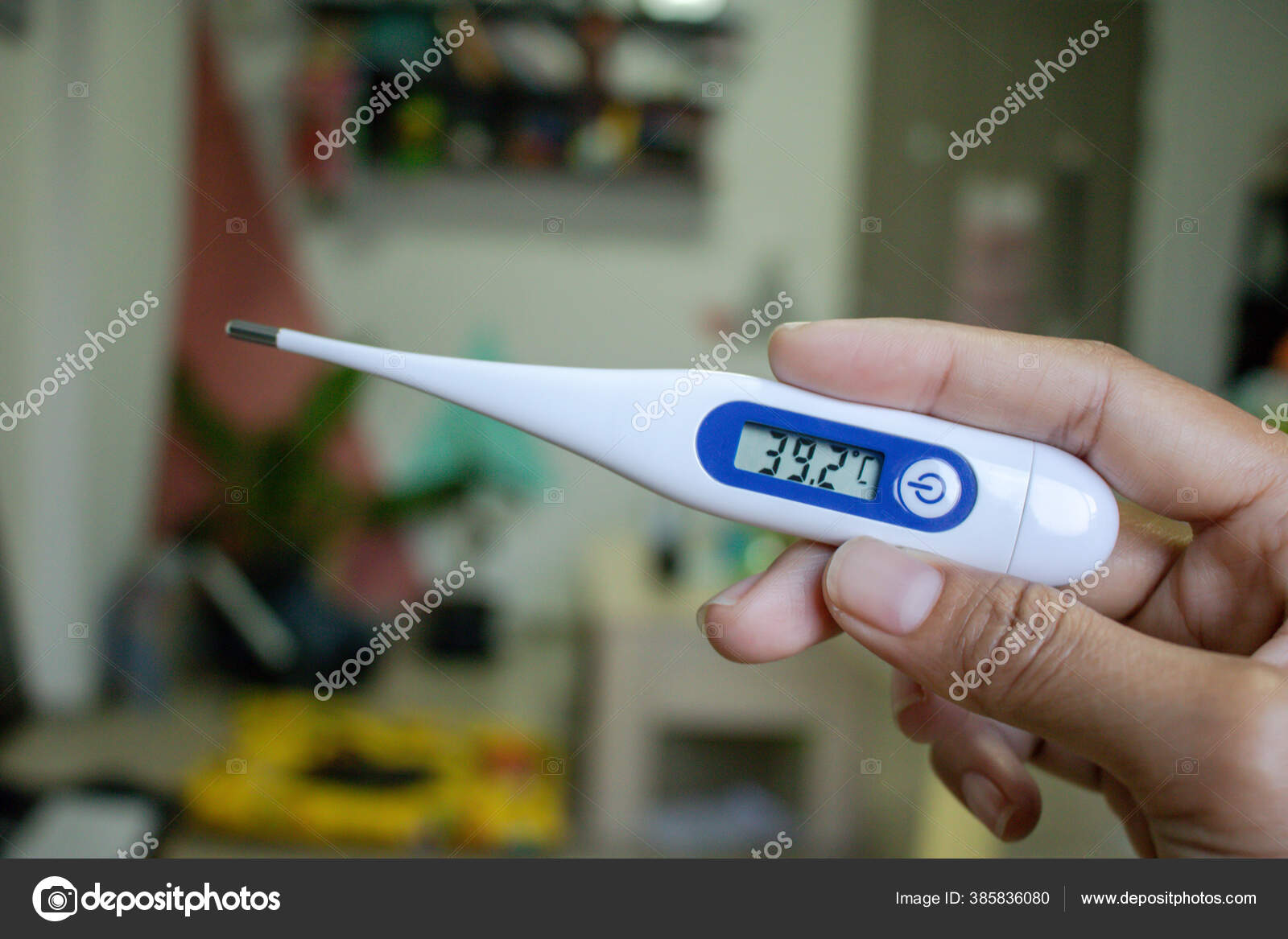 Thermometer with a High Fever Temperature Stock Image - Image of
