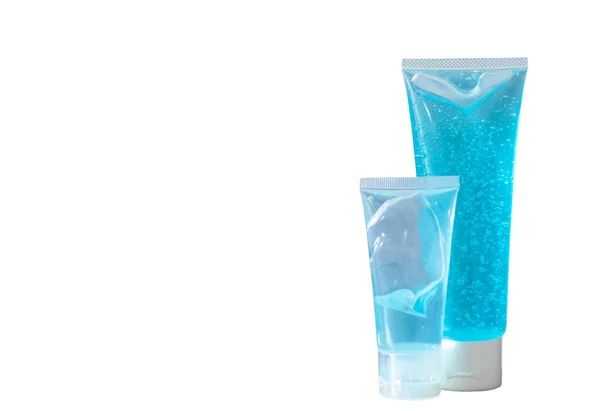 Dois Frascos Álcool Azul Gel Lado Direito Mesa Parede Branca — Fotografia de Stock