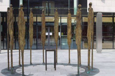 Rowan Gillespie's Proclamation sculpture honouring the leaders of the 1916 Easter Rising. Sited opposite Kilmainhan Gaol  in Dublin, Ireland, where they were executed.  clipart