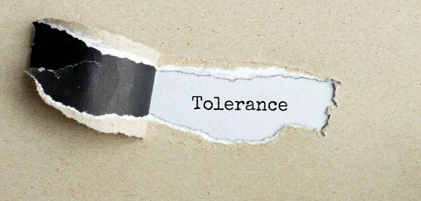 Text Tolerance Appearing Torn Brown Paper — Stock Photo, Image