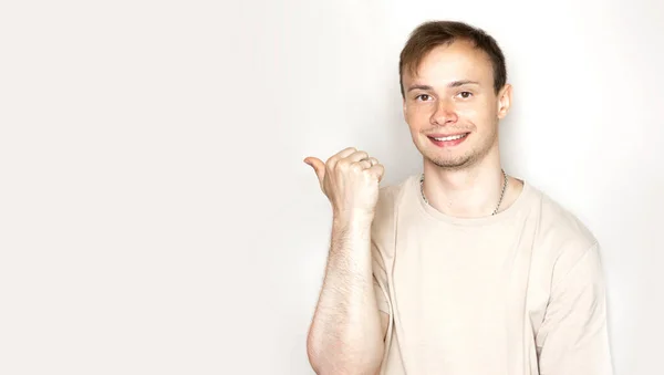 Portrait Excited Happy Man Pointing Finger Copyspace Isolated White Background — Stock Photo, Image