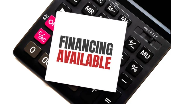 Beyaz kağıt ile FINANCING AVAILABLE ile hesap makinesi